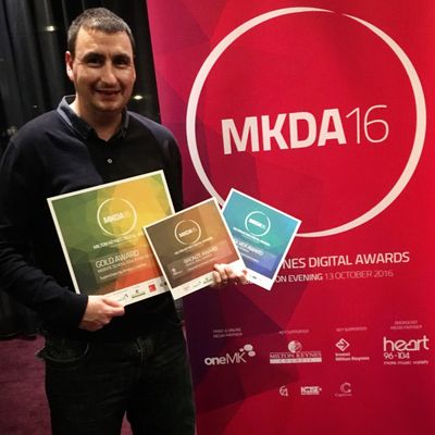 Terry Upton with his 3 awards on a successful night for Amasci at the MK Digital Awards 2016